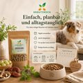 ImmuBalance Packung neben Futternapf und Kapseln zur einfachen täglichen Anwendung für Hunde.
